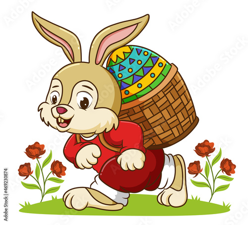 The rabbit is bringing a basket of the easter egg