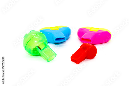 Toy Whistle on white background with selective focus