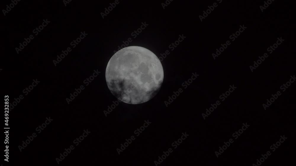 The full moon is covered with black clouds The full moon is covered with black clouds