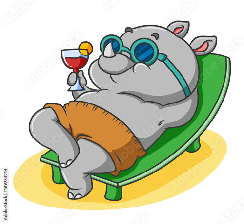 The baby rhino is sunbathing on the beach