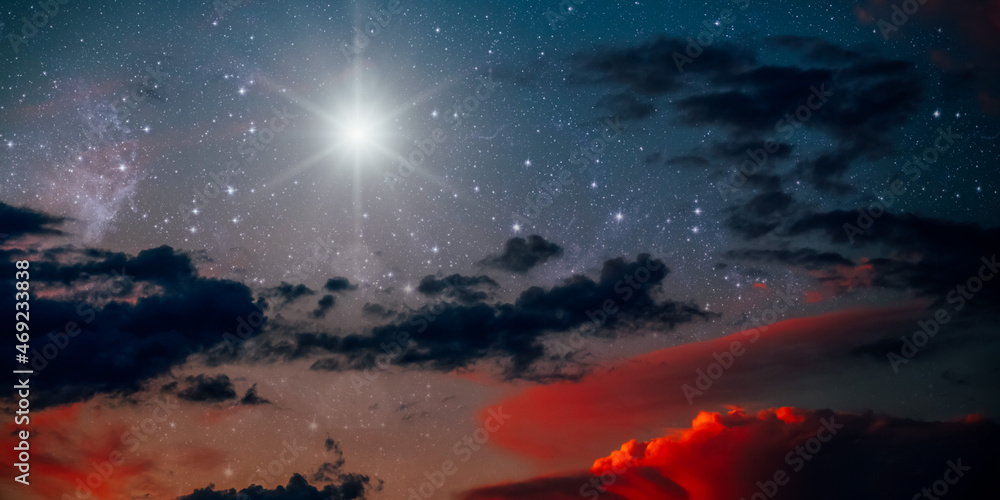 The star shines over the manger of christmas of Jesus Christ.