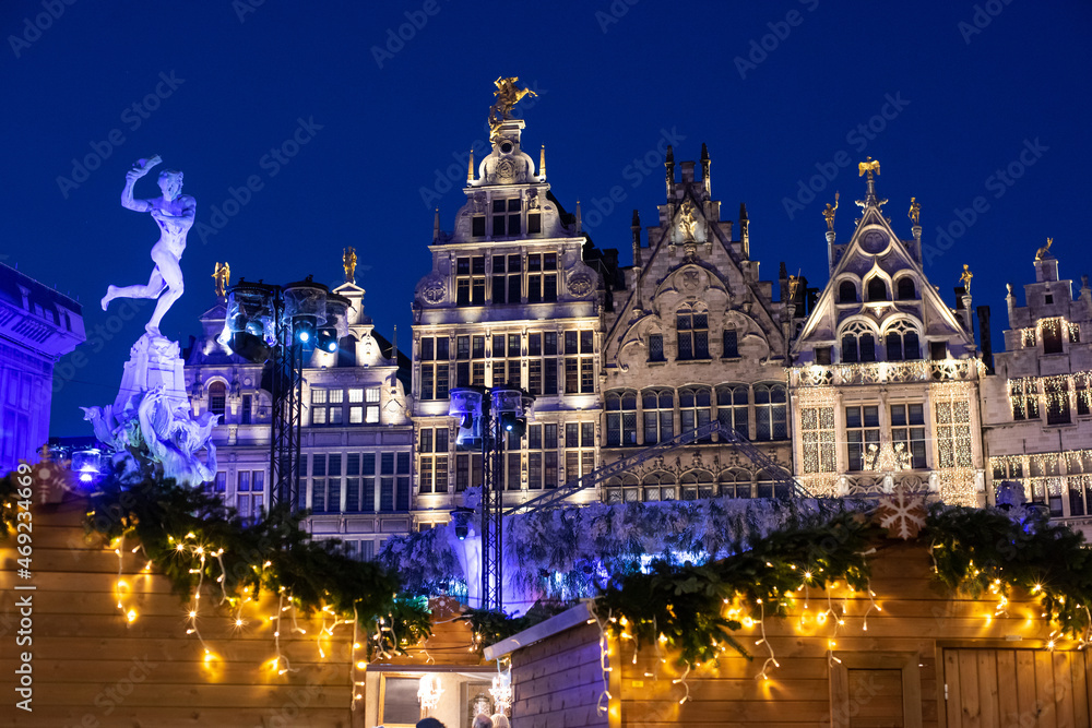 Traditional Christmas market in Europe, Antwerpen, Belgium. Main town square with decorated tree and lights. Christmas fair concept
