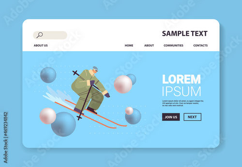 skier man sportsman skiing doing activities winter vacation concept full length horizontal