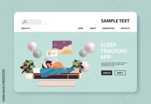 young woman sleeping in bed with electronic smart watch app tracker on hand quality and quantity sleep control