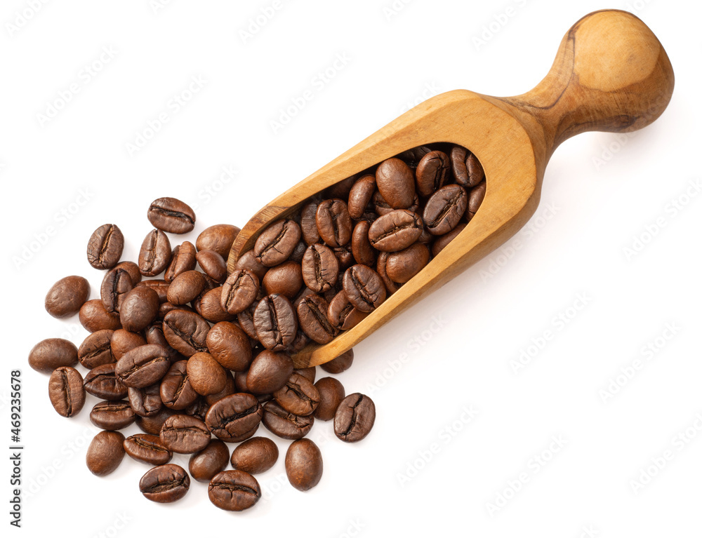 Fototapeta premium Coffee beans in the wooden scoop, isolated on white background, top view