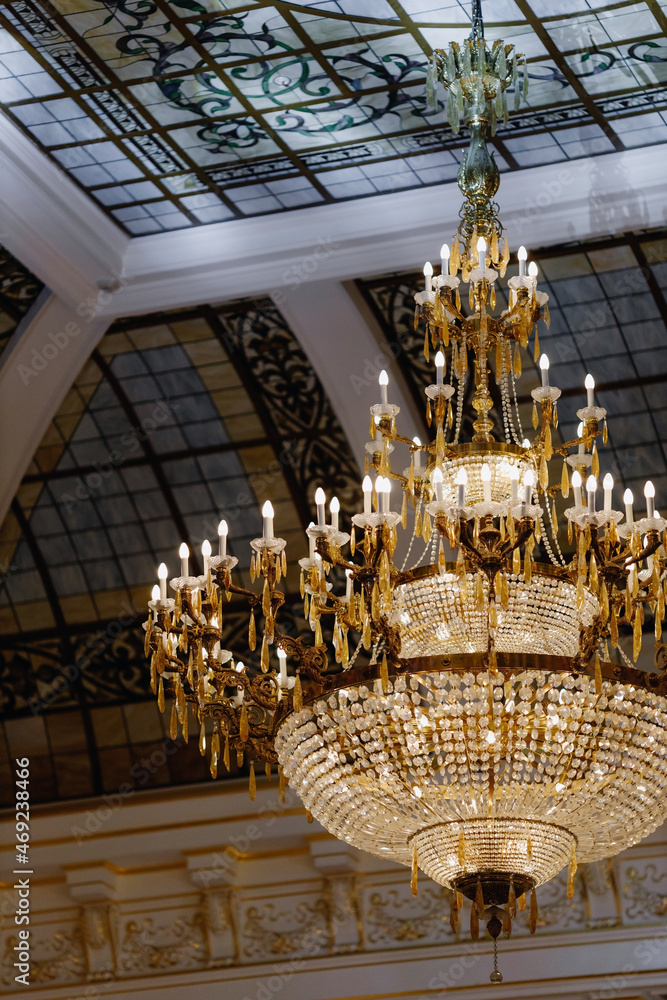 Luxurious vintage chandelier in the interior close-up