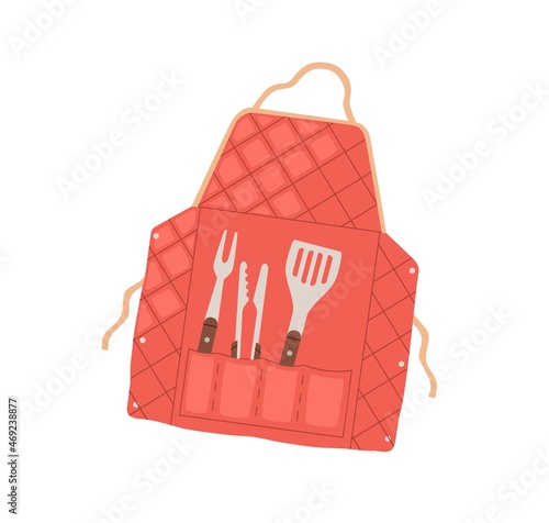 Butchers apron with grilling BBQ tools in pockets. Barbecue accessories and s...