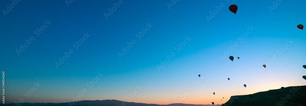 Hot air balloons at sunrise. Banner of hot air balloons on the sky in cappadocia