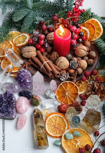 gemstones, candle and natural winter decor, candle. energy healing minerals for Witchcraft Esoteric Ritual. soul relax, life balance concept. Christmas, Magical Winter Solstice