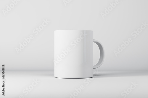 Empty white mug or cup on light background with mock up place for your advertisement. 3D Rendering.