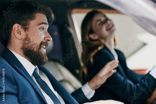 business man and woman driving a car transport © SHOTPRIME STUDIO