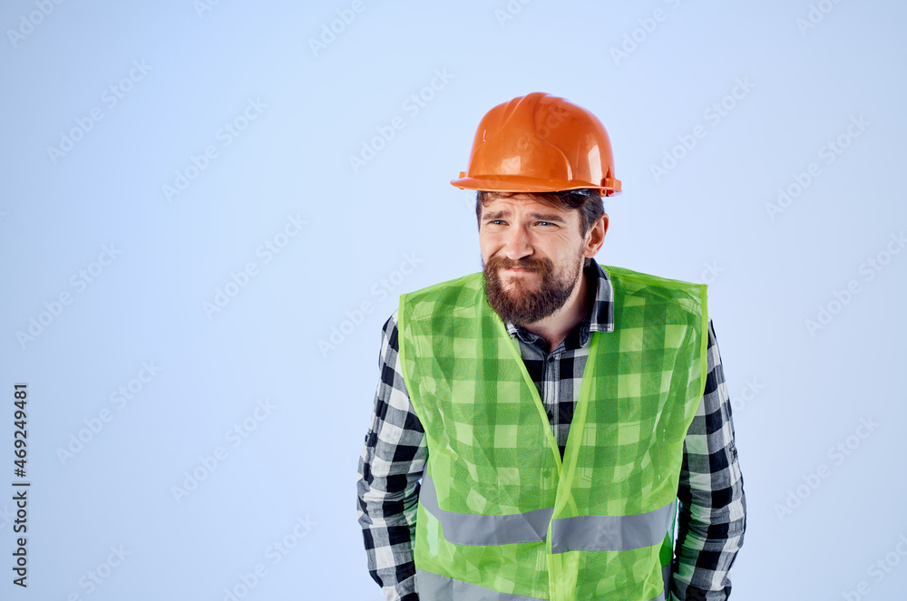 bearded man in working uniform construction building profession blue background bearded man in working uniform construction building profession blue background