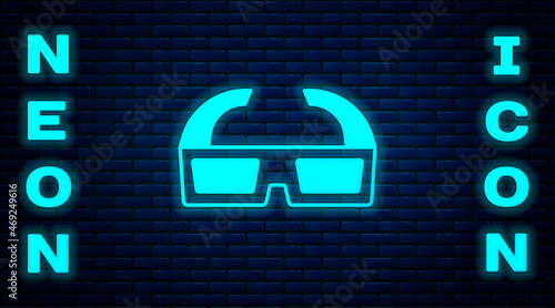 Glowing neon 3D cinema glasses icon isolated on brick wall background. Vector