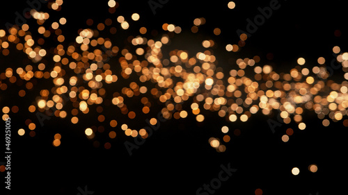 Abstract color particles on black background, close-up.