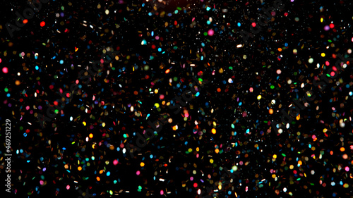 Abstract color particles on black background  close-up.