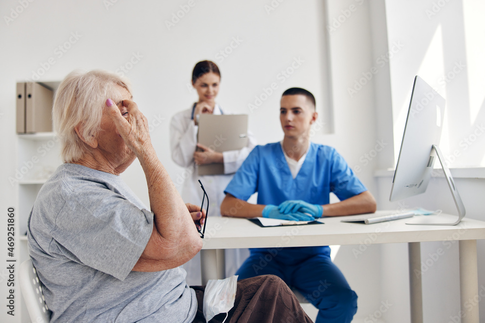 old woman hospital examination health care