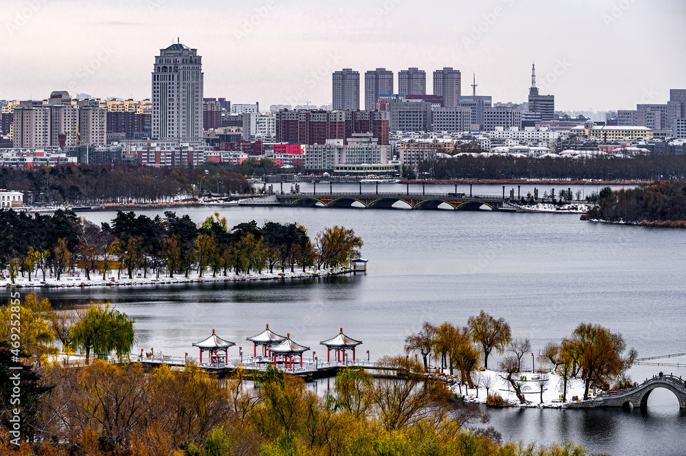 Fototapeta premium First Snow in Early Winter - Winter Scenery in Nanhu Park, Changchun, China