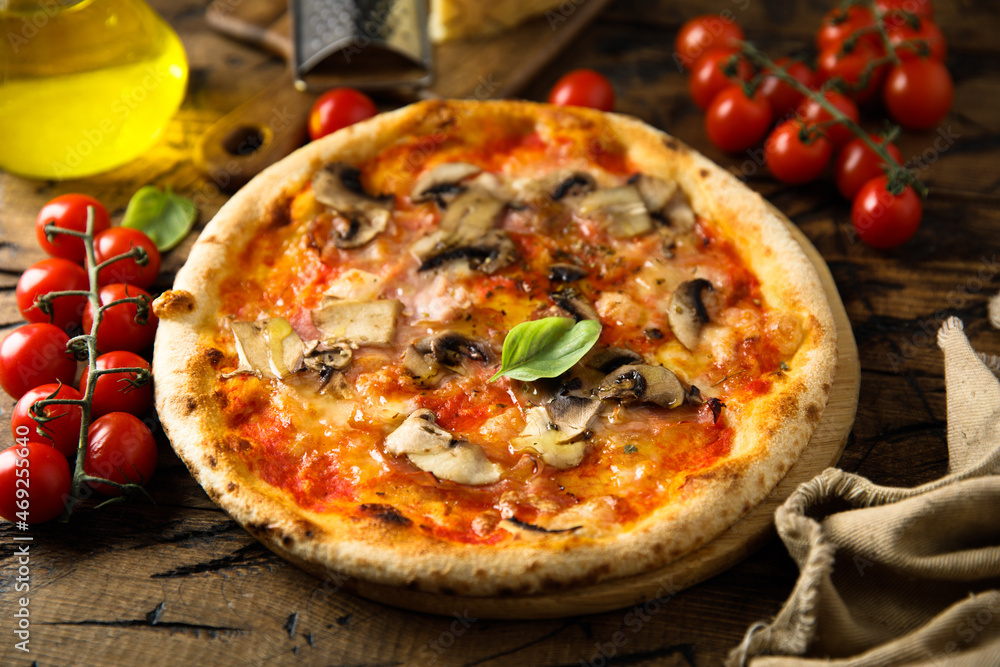 Traditional homemade pizza with mushroom and ham Traditional homemade pizza with mushroom and ham