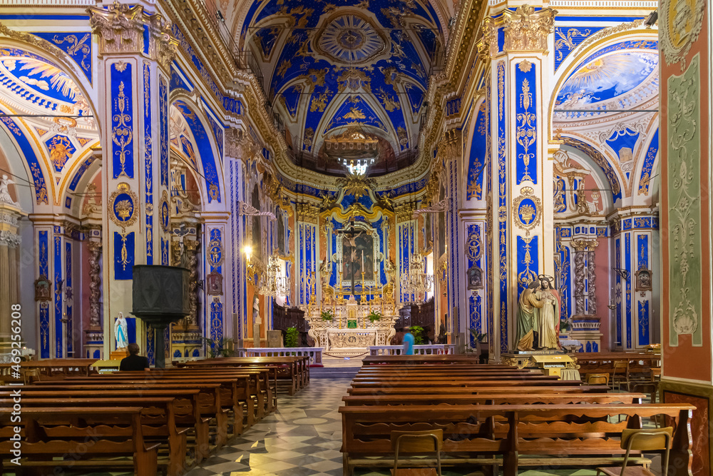 Interior of the Baroque church, Chiesa di San Tommaso in Dolcedo, a picturesque village near Imperia, Liguria, Italy 