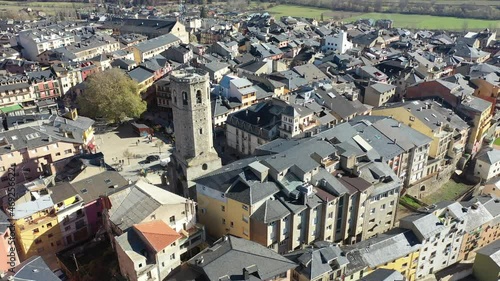 panoramic view of tower in square in Puigcerda in Spain top view of landscape with houses and tower in Puigcerda in Spain. High quality 4k footage photo