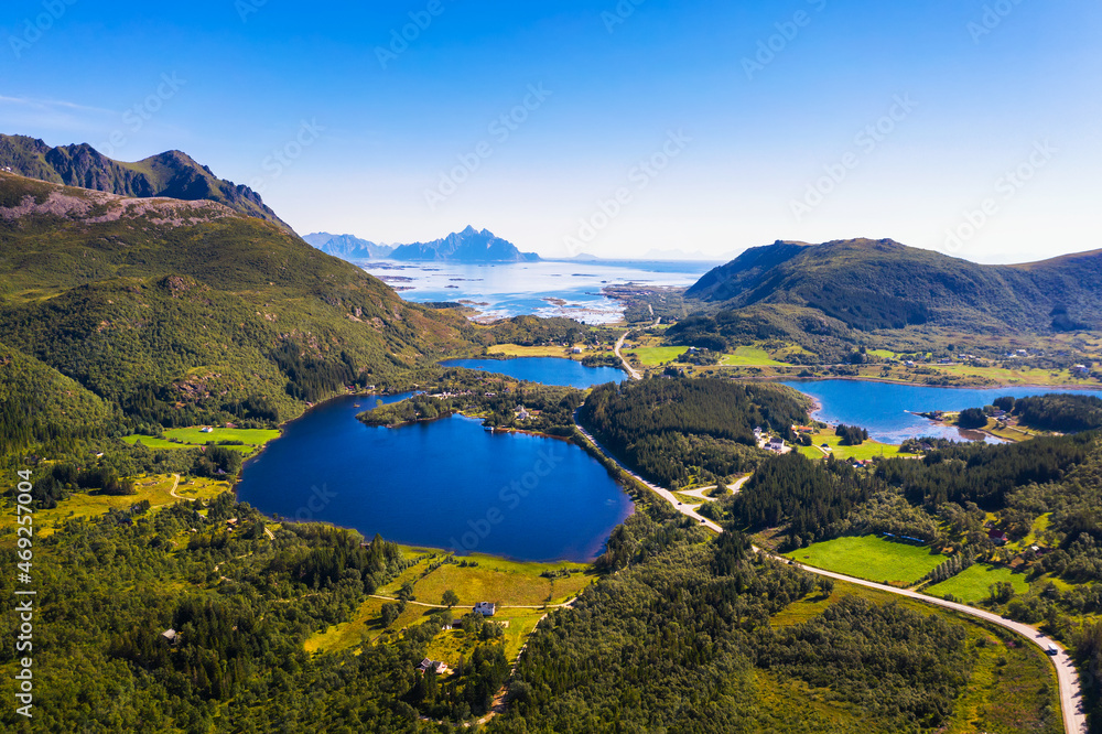 Obraz premium Aerial view of a road going through Lofoten Islands in Norway