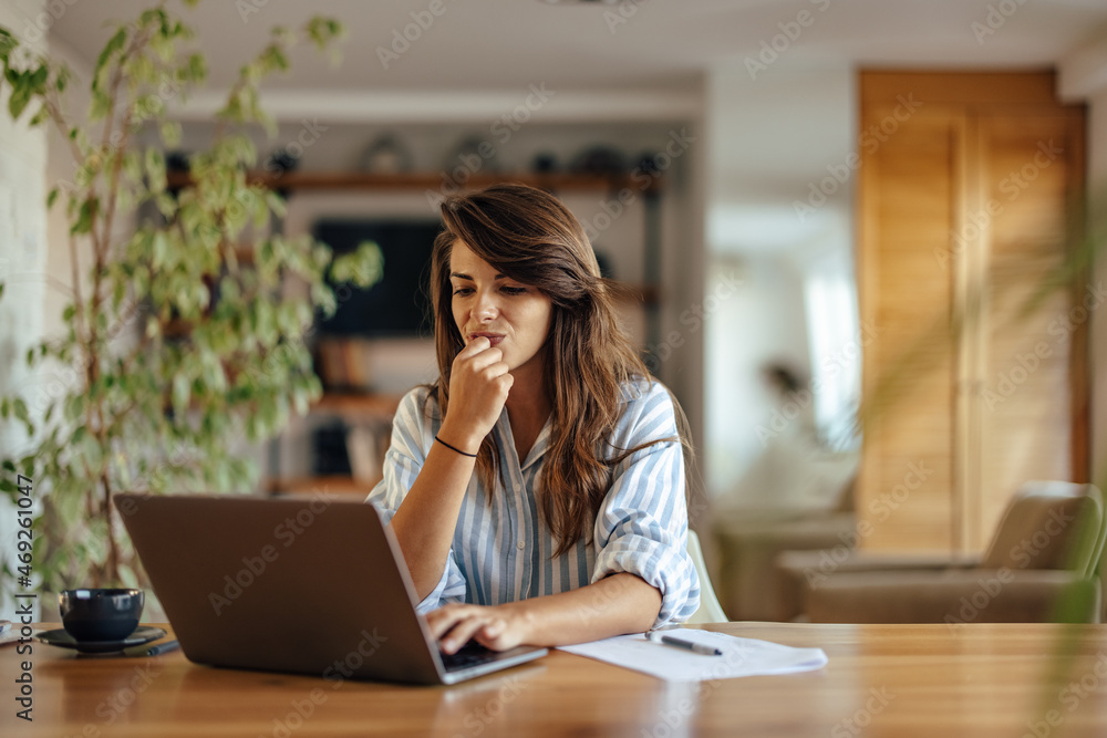 Young caucasian woman, absorbed in her work Young caucasian woman, absorbed in her work