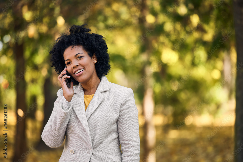 Carefree adult woman, speaking to her partner, on the phone Carefree adult woman, speaking to her partner, on the phone