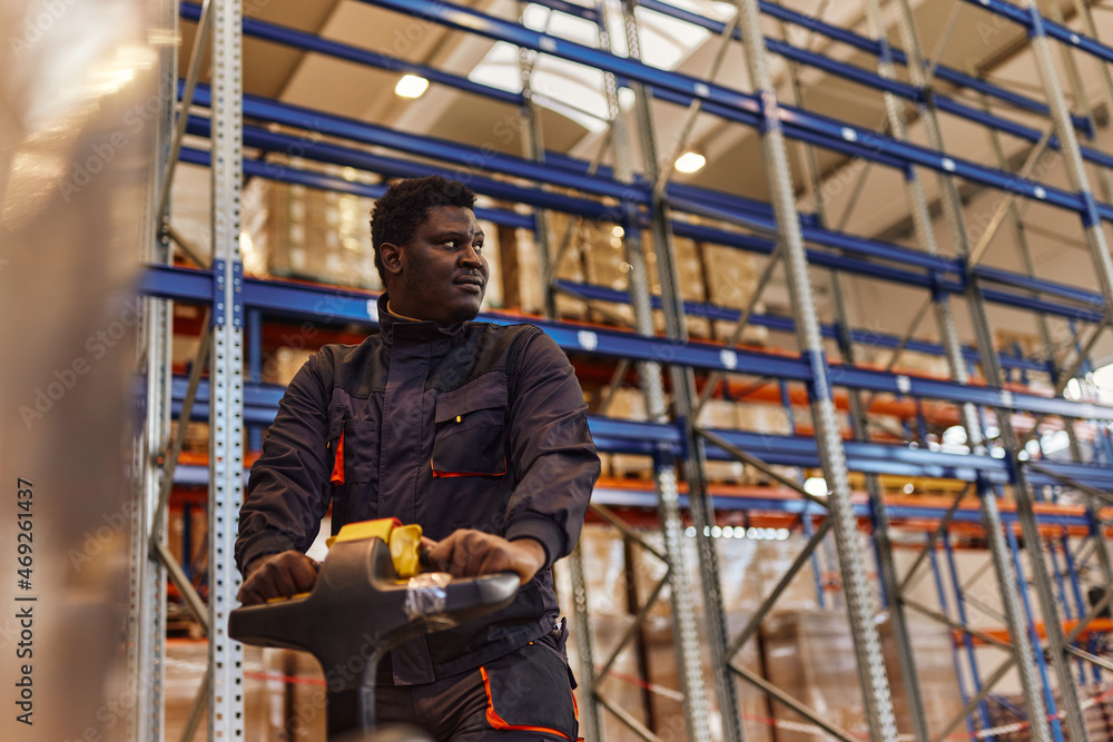 Fototapeta premium Busy factory worker, staring his next task