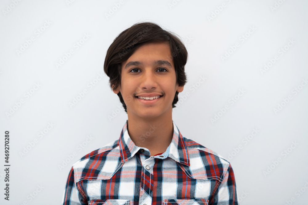 a portrait of a young attractive Arab boy isolated on a white background a portrait of a young attractive Arab boy isolated on a white background