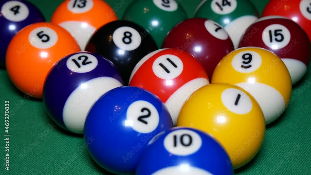 Break the pyramid in billiards. Clouse up.
American pool with all balls on the table in form of pyramid. Balls roll out in different directions. Break the pyramid in billiards. Clouse up.
American pool with all balls on the table in form of pyramid. Balls roll out in different directions.
