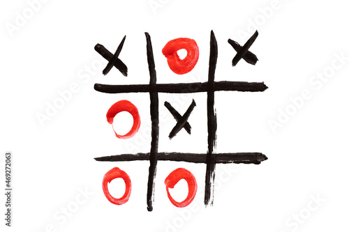 the game of tic-tac-toe is drawn on paints on white paper, play and rest, children's game of noughts crosses