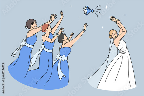 Bride in gown throw bouquet to bridesmaids. Happy woman fiancee and wedding guests involved in traditional custom. Girls maid of honor catch flowers. Marriage celebration concept. 
