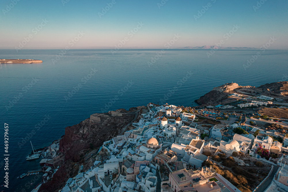 Naklejka premium Aerial view of the Oia Village at sunrise on Santorini Island, Greece