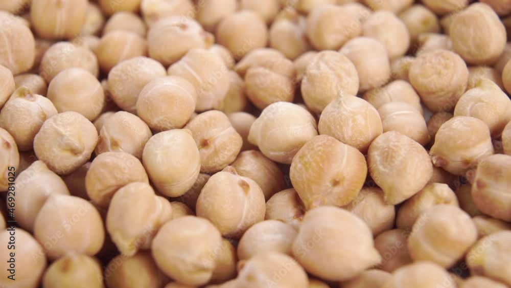 Dried legume chickpeas. Macro. Slow rotation. Cicer arietinum Dried legume chickpeas. Macro. Slow rotation. Cicer arietinum
