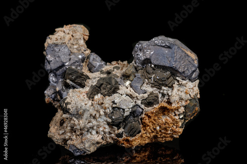 Macro stone mineral Galena on a black background