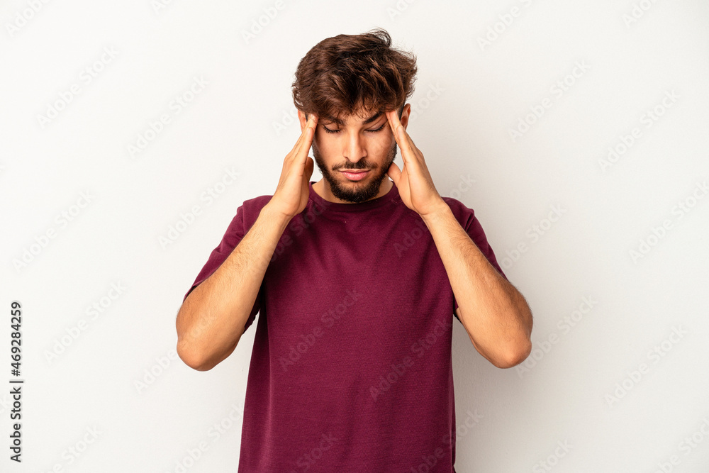 Young mixed race man isolated on grey background touching temples and having headache. Young mixed race man isolated on grey background touching temples and having headache.