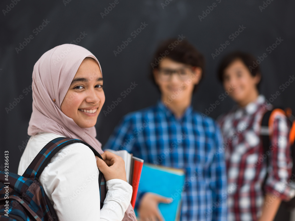 Arabic teenagers team, students group working together on laptop and tablet computer online classroom education concept. Selective focus Arabic teenagers team, students group working together on laptop and tablet computer online classroom education concept. Selective focus