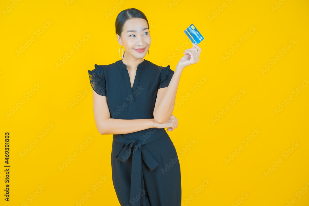 Portrait beautiful young asian woman smile with credit card Portrait beautiful young asian woman smile with credit card