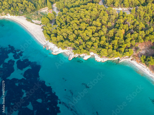 Aerial panoramic view over Milia beach in Skopelos island, against a cloudy sky in Sporades, Greece photo