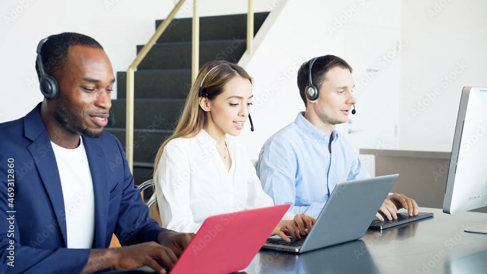 Group of multi racial people working in call center. Global business. Teamwork of business. Diversity. Group of multi racial people working in call center. Global business. Teamwork of business. Diversity.