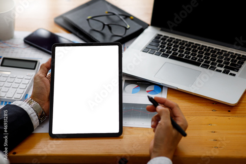 Businessman working at office with documents on his desk, doing planning analyzing the financial report, business plan investment, finance analysis concept