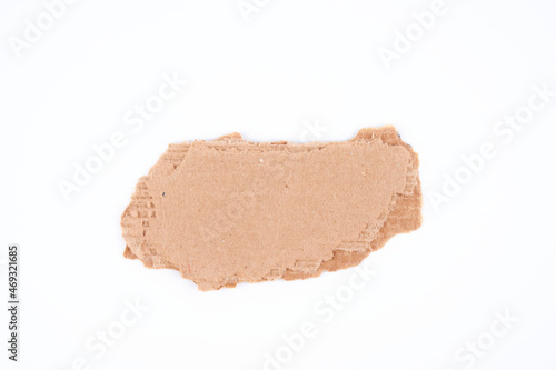 Piece of brown cardboard with blank place for text or picture isolated on white background, clipping path