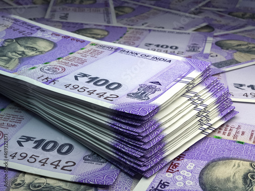 Indian money. Indian rupee banknotes. 100 INR rupees bills.