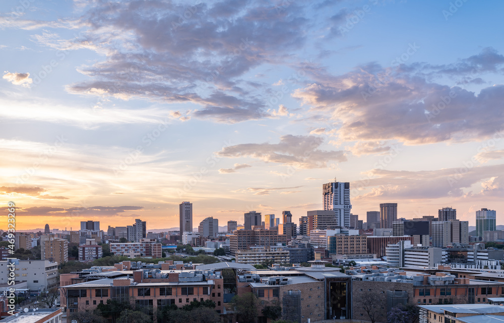 Aerial shot of Pretoria city skylines during a colourful sunset