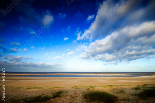 Vast empty beach of Burnham Overy Staithe, North Norfolk Coast, England, UK.