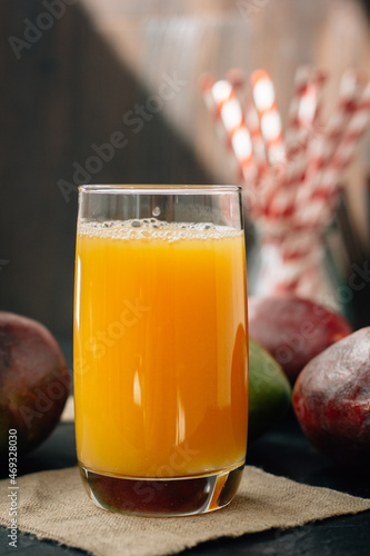 Mango juice in a glass, fre...