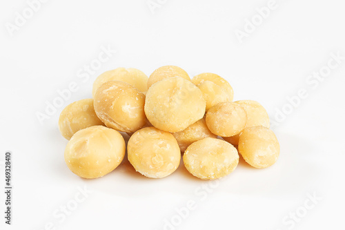 Lot of whole spicy salted peanut isolated on white background