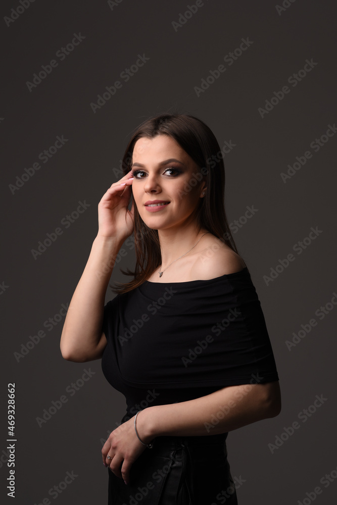 Portrait of pretty woman dark hair, brown eyes. Natural smile. Portrait of pretty woman dark hair, brown eyes. Natural smile.