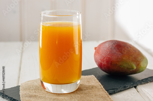 Mango juice in a glass, fre...