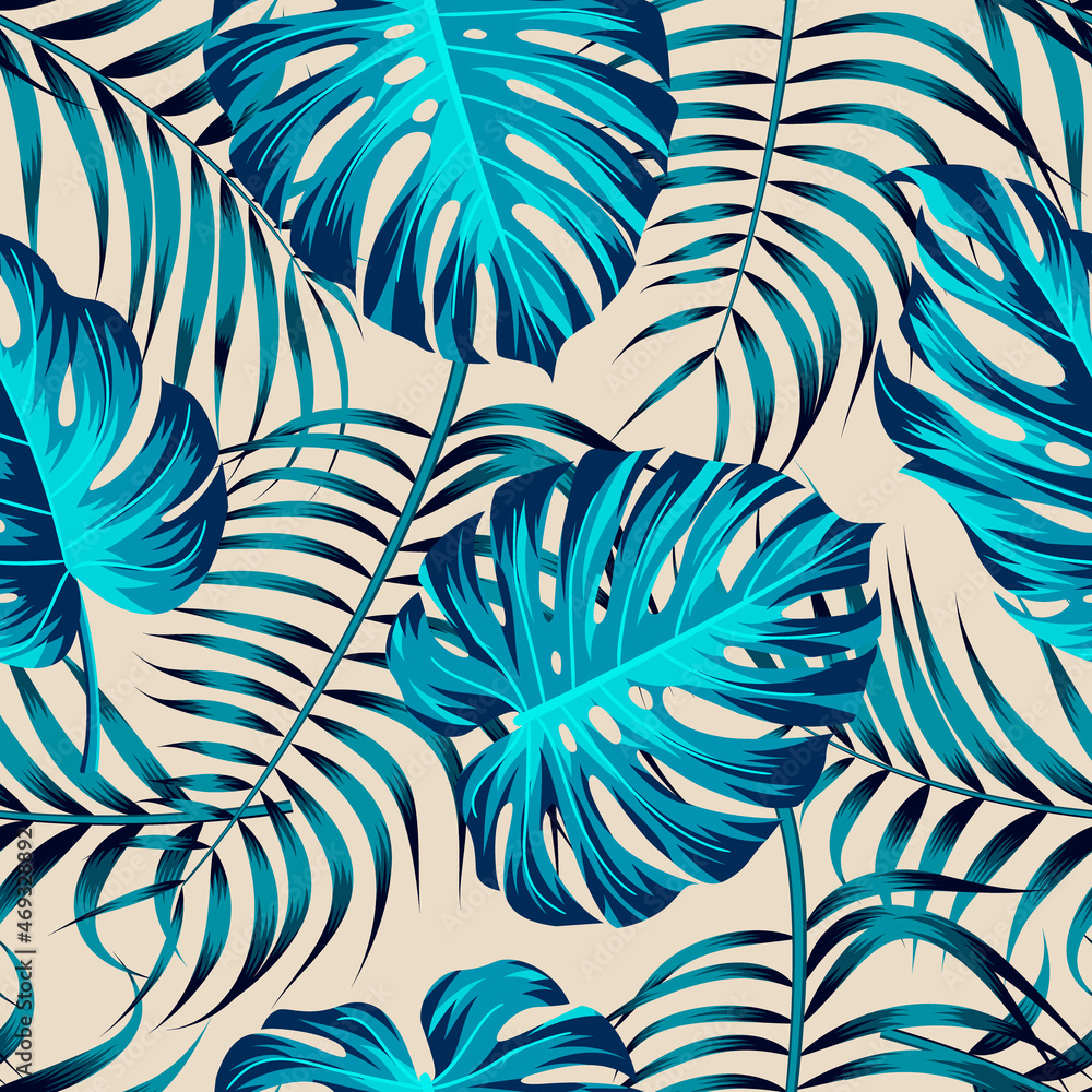Blue palm and monstera leaves